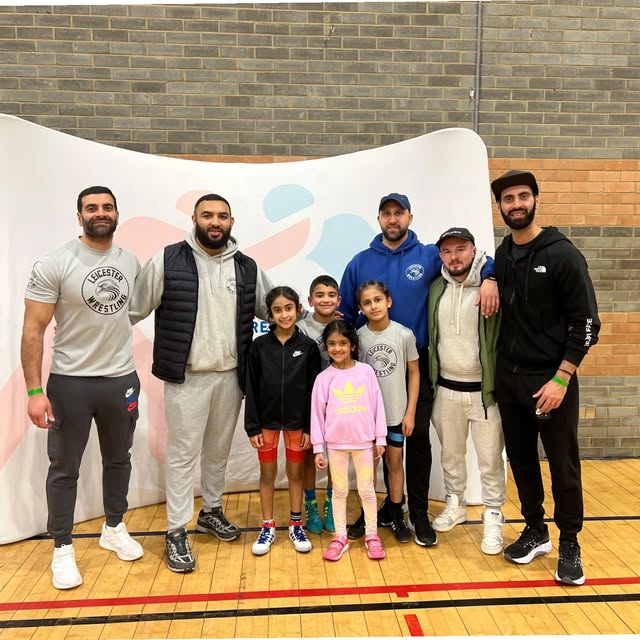 Club coaches and juniors at a national wrestling event